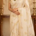 Ivory White Soft Tissue Saree with Golden Peacock Zari Border